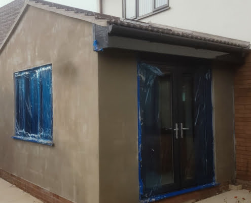 Smaller Project Small works to render the rear extension of a property