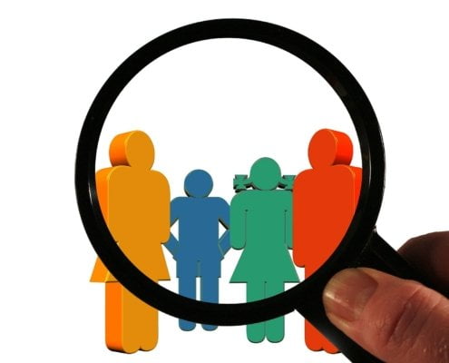 Magnifying glass highlighting focus on customers