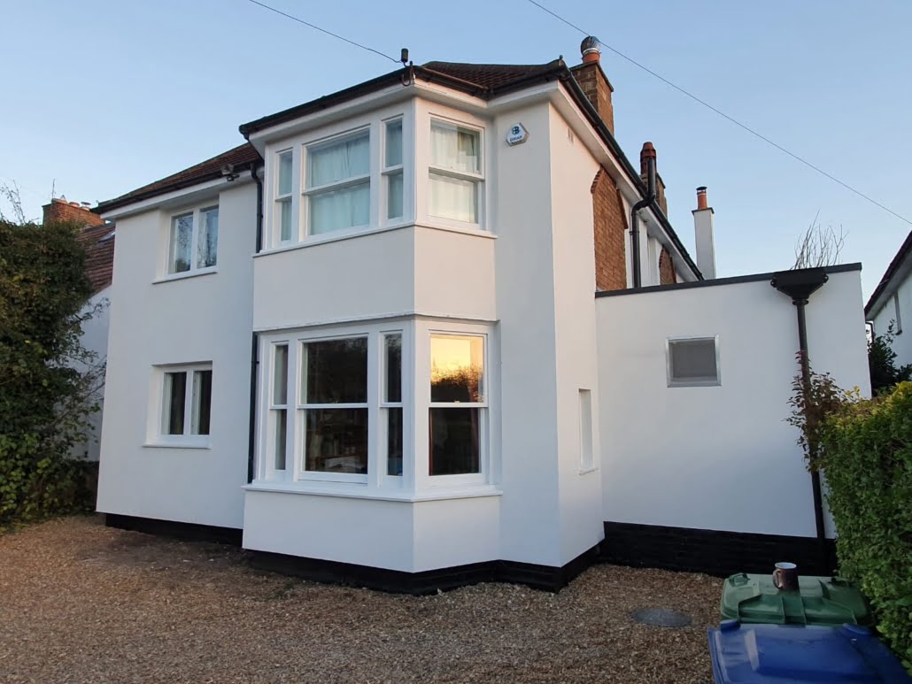 External Wall Insulation Finish Completed External Wall Insulation to a large home with bay windows