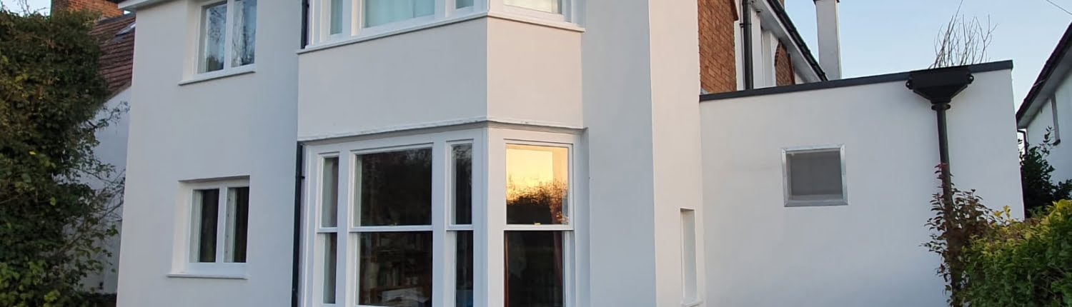 Completed External Wall Insulation to a large home with bay windows