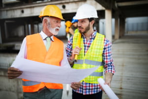 Construction workers discussing plans