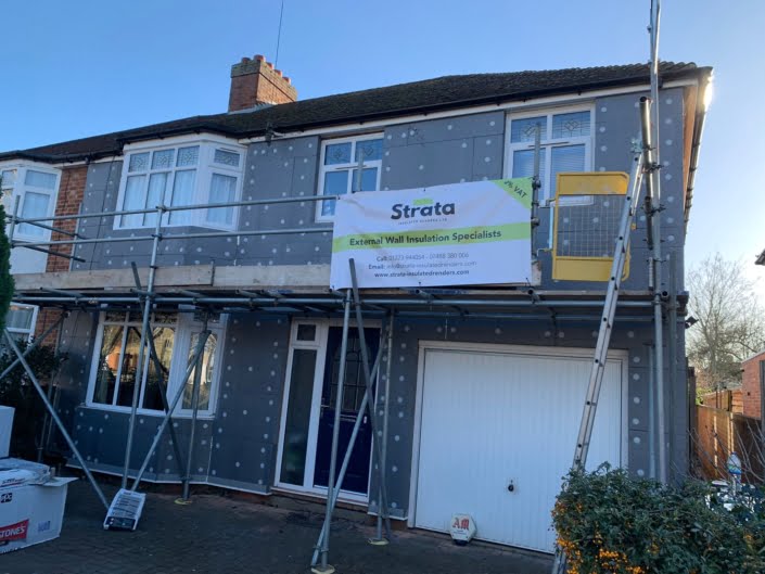 Strata Insulated Renders banner on Scaffold of EWI installation